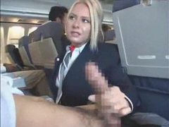 CrocoPost presents: Stewardess gives a handy j on plane