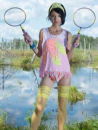 CrocoPost presents: Stunning skinny teen plays around with her body on the lap of nature with the blue sky complimenting her beauty.