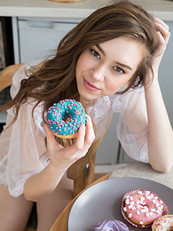 CrocoPost presents: If you are a fan of skinny girls, check out how this cute little doll poses and teases totally naked in the kitchen.